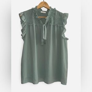 Pleione Ruffled Sleeveless Blouse